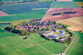 Village view from the east with a large farm in the south on the B85. in the district Neckeroda in Blankenhain in the state Thuringia, Germany