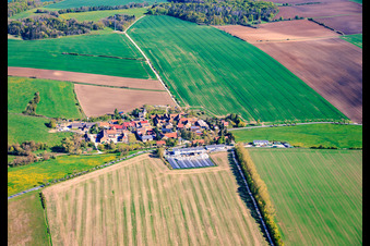 Village view from the east with a large farm in the south on the B85. in the district Neckeroda in Blankenhain in the state Thuringia, Germany