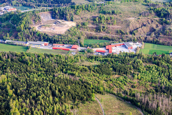 Industrial area to the left of State Road 220 with Max Frank Pressig GmbH in Pressig in the state Bavaria, Germany