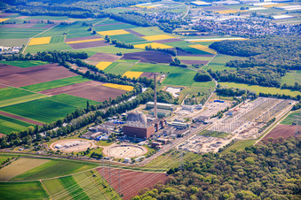 Decommissioned nuclear power plant Grafenrheinfeld of Preussenelektra GmbH on the banks of the Main River with Castor storage in the "gymnasium" and large substation in Grafenrheinfeld in the state Bavaria, Germany