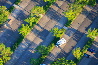 Parking lot of the town hall, swimming pool and sports facilities on Konrad-Lerch-Ring in Offenbach an der Queich in the state Rhineland-Palatinate, Germany