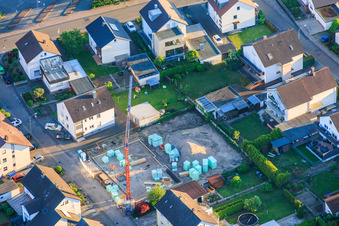 Construction site for a new apartment building on Konrad-Adenauer-Straße in Herxheim bei Landau in the state Rhineland-Palatinate, Germany