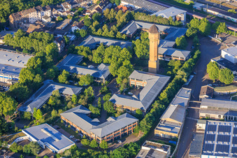 The Plant High-Tech Park Mannheim and Carlo Schmid School Mannheim with Historic Water Tower, Schildkröt Company in the district Neckarau in Mannheim in the state Baden-Wuerttemberg, Germany