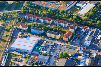 Residential developments and Pepperl+Fuchs Vertrieb Deutschland GmbH in Franz-Grashof-Straße from the west in the district Neckarau in Mannheim in the state Baden-Wuerttemberg, Germany