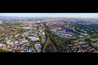 View of the district from the east, on both sides of the railway tracks up to the Rhine, with Rhenus Automotive and John Deere GmbH & Co KG in the foreground, Fahrlach industrial park. in the district Almenhof in Mannheim in the state Baden-Wuerttemberg, Germany