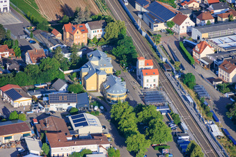 Railway station and commercial building at Bahnhofsplatz with OCLC GmbH in the district Böhl in Böhl-Iggelheim in the state Rhineland-Palatinate, Germany