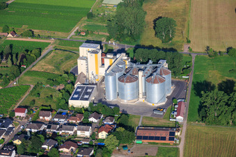 Silos and production buildings of the Cornexo GmbH mill from the northeast in Freimersheim in the state Rhineland-Palatinate, Germany