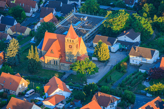 St. Michael's Catholic Church in the last light of evening in Insheim in the state Rhineland-Palatinate, Germany