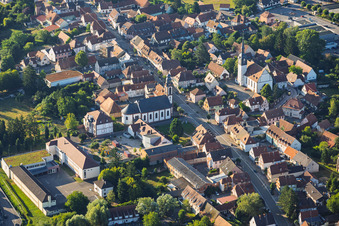 Town hall/primary school, Saint-Pierre-Saint-Paul Church, and Protestant Church of Soultz-sous-Forêts in Soultz-sous-Forêts in the state Bas-Rhin, France