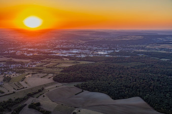Sunset over the industrial area in the district Zone Industrielle du Grand Bois Fayencerie in Saargemünd in the state Moselle, France