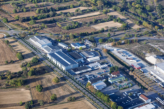 Industriestraße industrial area with Autohaus Kühn (Seat), Götz Maschinenbau GmbH & Co. KG, and Logistik Schmitt (PCC site Ötigheim) in Ötigheim in the state Baden-Wuerttemberg, Germany