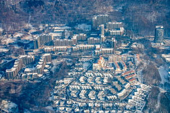 Winter view of Bothestraße from the west with snow in the district Emmertsgrund in Heidelberg in the state Baden-Wuerttemberg, Germany