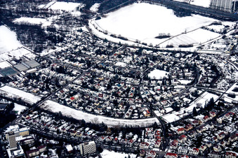 Wintry snowy Residential area of the multi-family house settlement Maerchenring in the district Rueppurr in Karlsruhe in the state Baden-Wurttemberg, Germany