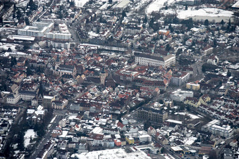 Aerial view of Wintry snowy Town View of the streets and houses of the residential areas in Ettlingen in the state Baden-Wurttemberg