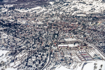 City view from the north in winter with snow in Ettlingen in the state Baden-Wuerttemberg, Germany