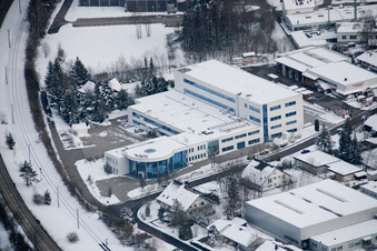 Aerial view of Wintry snowy Industrial and commercial area in the district Ittersbach in Karlsbad in the state Baden-Wurttemberg
