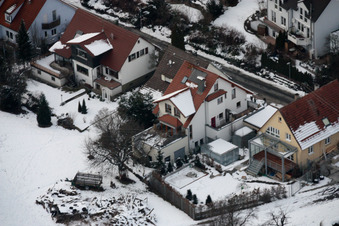 Aerial view of Mühlgasse in winter with snow in the district Gräfenhausen in Birkenfeld in the state Baden-Wuerttemberg, Germany