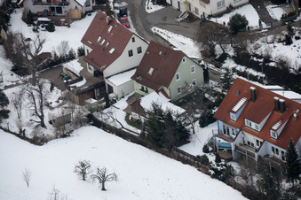 Mühlgasse in winter with snow in the district Gräfenhausen in Birkenfeld in the state Baden-Wuerttemberg, Germany from above