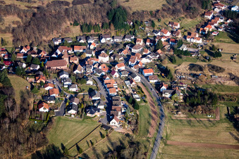 Village - view on the edge of agricultural fields and farmland in Niederschlettenbach in the state Rhineland-Palatinate, Germany