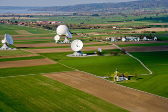 Parabolic satellite dishes Erdfunkstelle Raisting on Hofstaetterweg in Raisting in the state Bavaria