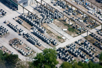 Warehouse with concrete pipes from Heidelberg Materials Mineralik in Hagenbach in the state Rhineland-Palatinate, Germany