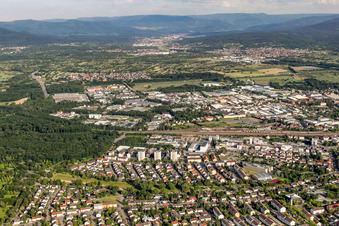 Industrial area Rauentaler Straße beyond the railway line in Rastatt in the state Baden-Wuerttemberg, Germany
