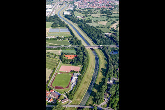 Shore areas of the reinforced by flood protection dam riverbed course of the river Murg in the district Niederbuehl in Rastatt in the state Baden-Wurttemberg, Germany