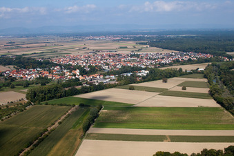 Aerial photograpy of Village - view on the edge of agricultural fields and farmland in Hoerdt in the state Rhineland-Palatinate