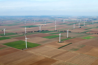 Wind turbine windmills on a field in Flomborn in the state Rhineland-Palatinate
