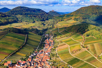 Trifels behind a wine-growing village between vineyards from the east in Ranschbach in the state Rhineland-Palatinate, Germany