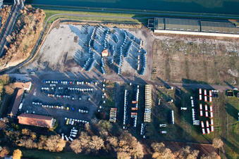 Oblique view of Truck storage on the Rhine in the district Maximiliansau in Wörth am Rhein in the state Rhineland-Palatinate, Germany