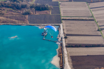 Aerial view of HBM Hagenbacher Bau Mineralstoffe GmbH&Co.KG quarry lake in Hagenbach in the state Rhineland-Palatinate, Germany