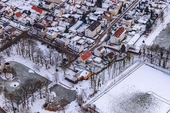 Aerial photograpy of Swan pond frozen in winter in Kandel in the state Rhineland-Palatinate, Germany