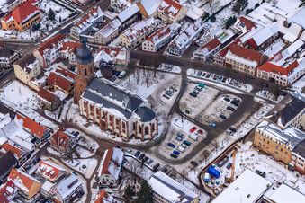 Market Square, Church in winter with snow in Kandel in the state Rhineland-Palatinate, Germany