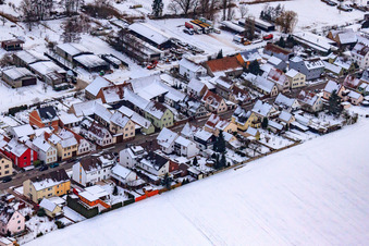 Aerial photograpy of Saarstraße in winter with snow in Kandel in the state Rhineland-Palatinate, Germany