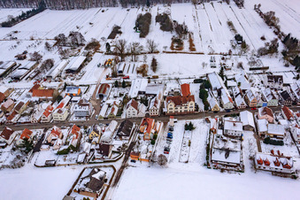 Saarstraße in winter with snow in Kandel in the state Rhineland-Palatinate, Germany from the plane