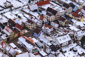 Drone image of Saarstraße in winter with snow in Kandel in the state Rhineland-Palatinate, Germany
