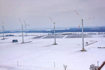 Aerial view of Wind turbines in winter when there is snow in Minfeld in the state Rhineland-Palatinate, Germany
