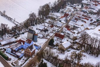 Main street in snow in Vollmersweiler in the state Rhineland-Palatinate, Germany