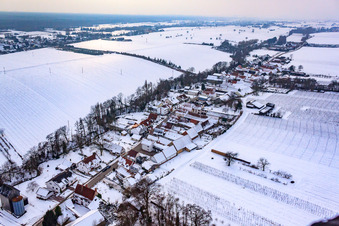 Aerial photograpy of Main street in snow in Vollmersweiler in the state Rhineland-Palatinate, Germany