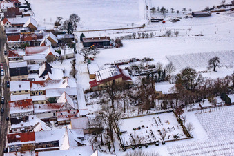 Cemetery in the snow in Vollmersweiler in the state Rhineland-Palatinate, Germany