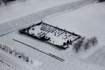 Oblique view of Cemetery in the snow in the district Kleinsteinfeld in Niederotterbach in the state Rhineland-Palatinate, Germany