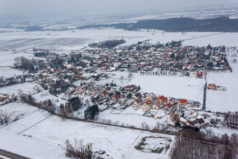 Winter snow-covered village view in Barbelroth in the state Rhineland-Palatinate, Germany