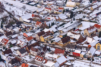 Aerial view of Main street in winter in the snow in Barbelroth in the state Rhineland-Palatinate, Germany