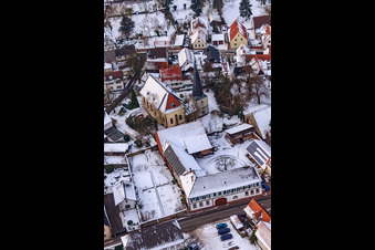 Oblique view of Church in the snow in Barbelroth in the state Rhineland-Palatinate, Germany