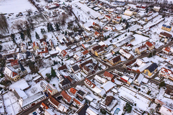 Aerial photograpy of Main street in winter in the snow in Barbelroth in the state Rhineland-Palatinate, Germany