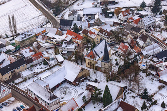 Church in the snow in Barbelroth in the state Rhineland-Palatinate, Germany out of the air