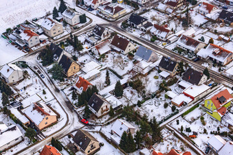 Schützenstraße in the snow in Barbelroth in the state Rhineland-Palatinate, Germany