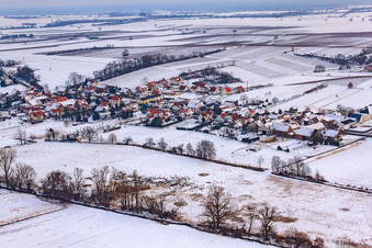 Village view from the northwest in snow in Hergersweiler in the state Rhineland-Palatinate, Germany