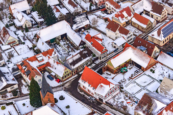 Kirchstraße in the snow in Winden in the state Rhineland-Palatinate, Germany